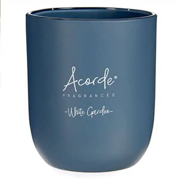 3-velas-aromáticas-vaso-flores-blancas